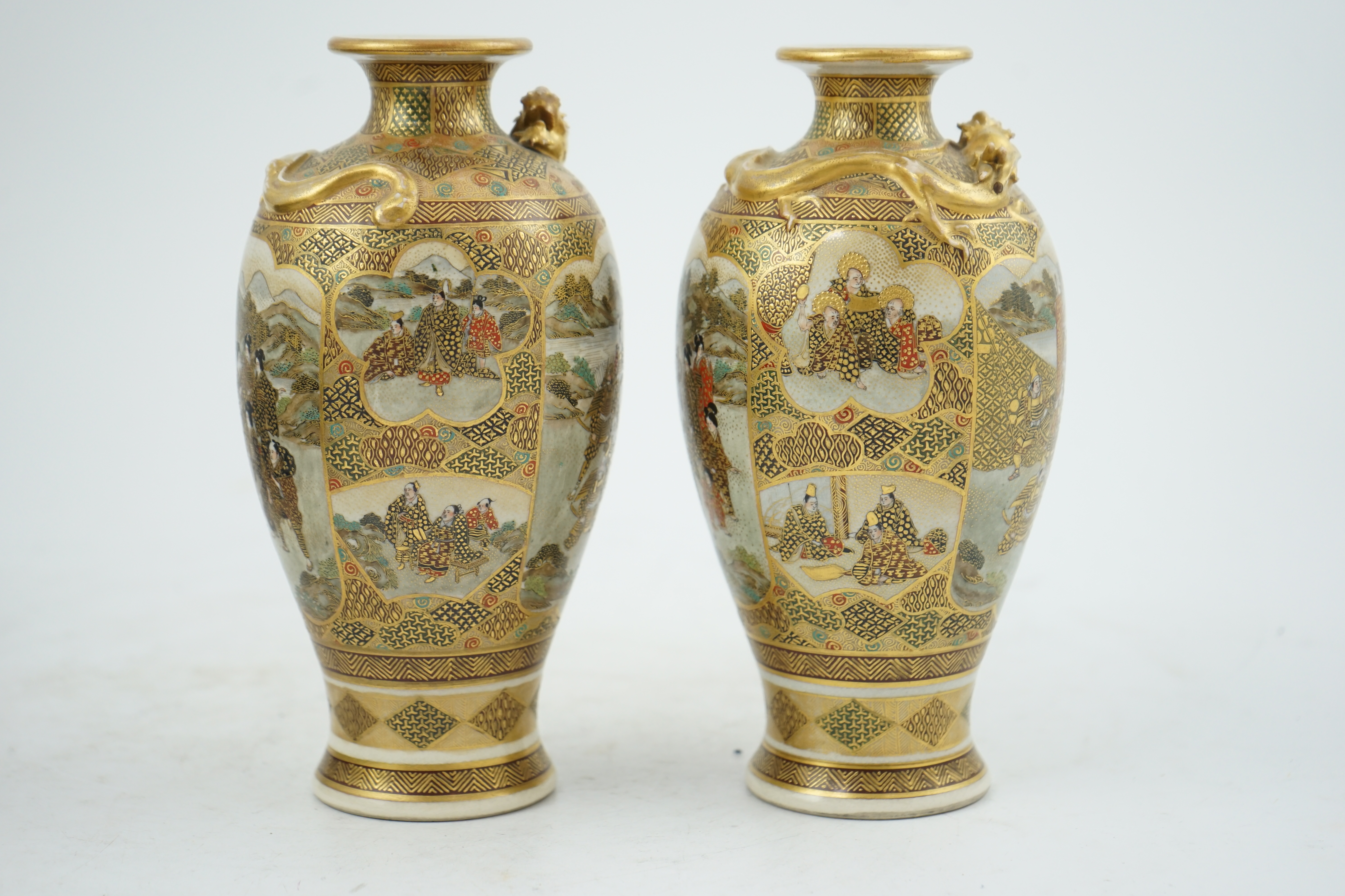 A pair of Japanese Satsuma 'dragon' vases, Meiji period